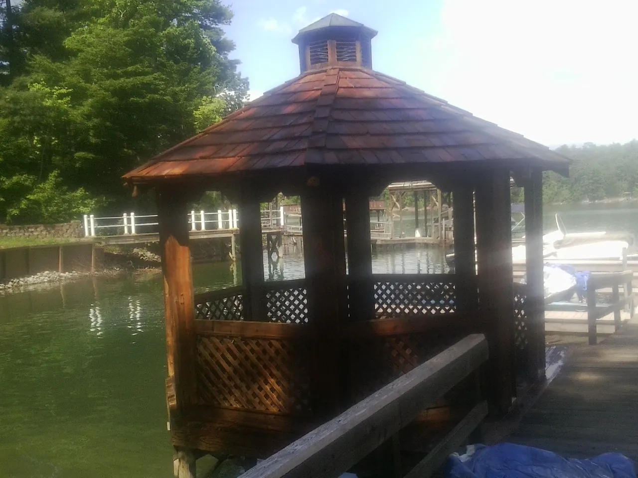 Cedar shake gazebo roof rebuilt on a lake dock in Searchlight